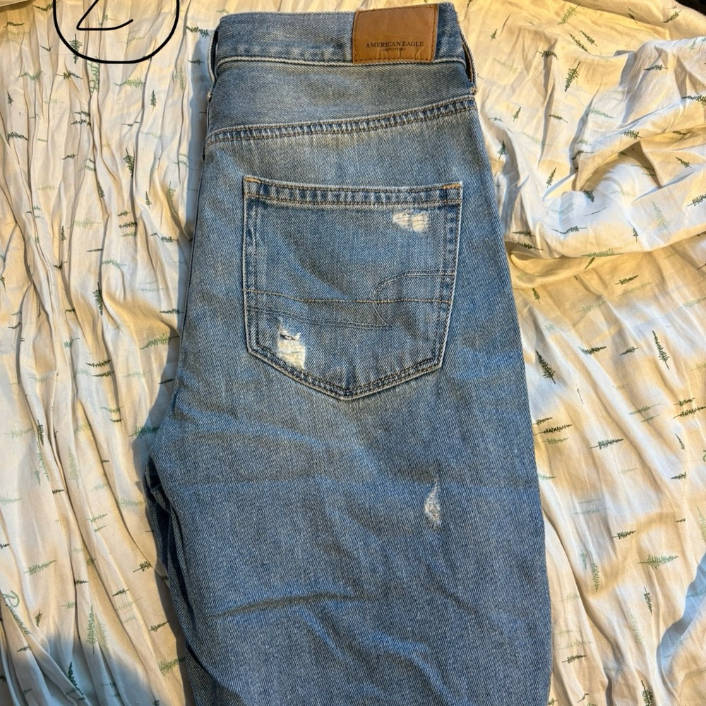 Distressed Blue Jeans